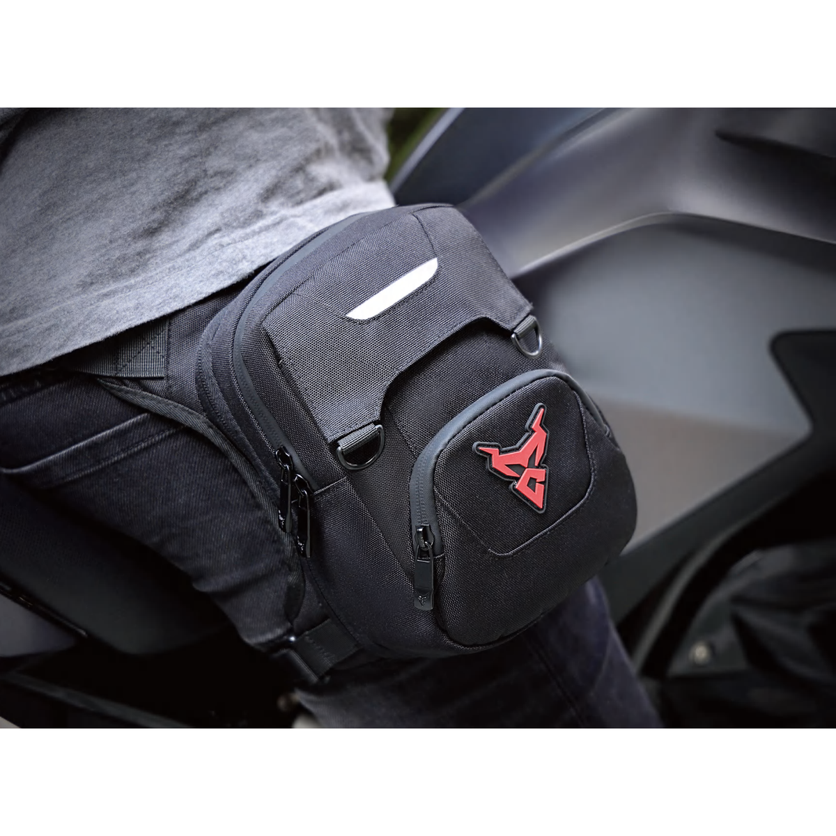 Sacoche de jambe moto extensible